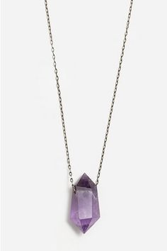 A powerful healing stone, this hand selected amethyst crystal rests on a 22 sterling silver chain. Amethyst has been celebrated throughout the centuries for it s beautiful lavender hue and ability to bring forth the purest aspirations of the wearer. It is thought to enhance intuition, while also calming the mind and spirit. We love amethyst as a stone to wear or hold during morning meditation or quiet, grounding moments in your day. Note: each stone is one-of-a-kind so there may be slight variat Purple Amethyst Necklace With Raw Stone, Spiritual Purple Necklace With Large Stone, Spiritual Faceted Amethyst Crystal Necklace, Faceted Amethyst Healing Necklace, Lavender Sterling Silver Healing Necklace, Lavender Sterling Silver Necklace For Healing, Lavender Natural Stones Sterling Silver Necklaces, Silver Amethyst Necklace With Raw Stone, Lavender Sterling Silver Necklace With Natural Stones