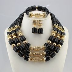 Bridal Nigerian Wedding Beads Jewelry Set Fashion JW1027 series – LaceDesign workshops Elegant Black Beaded Jewelry, Black Beaded Necklaces For Wedding, Formal Silver Jewelry With Gold Beads, Gold Polished Beads Jewelry For Wedding, Gold Beaded Necklaces With Black Beads For Weddings, Luxury Formal Jewelry With Black Beads, Elegant Gold Jewelry Sets With Polished Beads, Classic Gold Beaded Necklaces For Wedding, Elegant Polished Beads Jewelry For Wedding