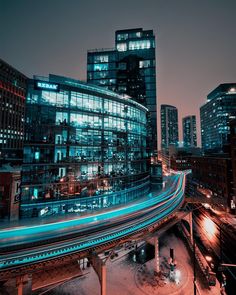 the city is lit up at night and it looks like something from another time lapse