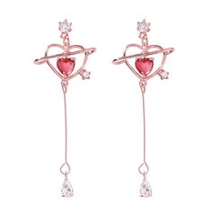 These delicately dangling drop earrings feature sparkling cubic zirconia embellishments and a dainty heart-cut crystal inside an 18-karat gold-plated open heart. 0.39" W x 1.85" L 18k gold-plated copper / red crystal / cubic zirconia Anime Earrings, Saturn Earrings, Pink Heart Earrings, Kawaii Earrings, Kawaii Jewelry, Heart Dangle Earrings, Heart Shaped Earrings, Heart Drop Earrings, Threader Earrings