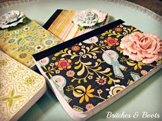 there are many different types of cards on the table with flowers in each card holder