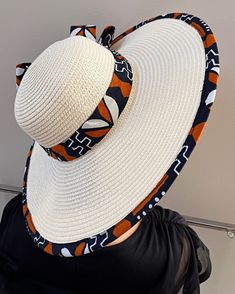 ombines timeless elegance with vibrant cultural flair. Handcrafted with care, this hat features a beautifully woven straw base adorned with bold African print fabric, offering both style and sun protection. Perfect for church services, outdoor events, or simply adding a touch of sophistication to your outfit, this hat blends tradition with modern design. Lightweight and breathable, it's as comfortable as it is striking. Elevate your look with a hat that celebrates heritage and craftsmanship. One size: should fit all. **** The straw hat color might vary from white to Beige. White Straw Hat With Curved Brim, White Panama Hat With Flat Brim For The Beach, White Panama Hat With Flat Brim For Beach, White Panama Hat For Beach With Flat Brim, White Toquilla Straw Panama Hat For Summer, White Bohemian Brimmed Sun Hat, White Bohemian Wide Brim Boater Hat, White Toquilla Straw Hat With Curved Brim, White Brimmed Toquilla Straw Boater Hat