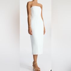 The Elizabeth Dress, A Part Of A.L.C.'S Signature Collection, Is Impeccably Cut From Structured Winter White Fabric. This Midi Silhouette Is Strapless, Featuring Pockets And Darted Seams For A Feminine Fit. We Recommend To Size Up One From Your Typical Size White Knee-length Strapless Formal Dress, Chic Midi Strapless Dress For Wedding, Summer Midi Dress With Straight Neckline For Dinner, Fitted Midi Strapless Dress For Dinner, Fitted Midi Length Strapless Dress For Dinner, Summer Strapless Fitted Dinner Dress, Fitted Strapless Midi Dress For Dinner, Summer Strapless Fitted Dress For Dinner, Fitted Strapless Dress For Summer Dinner