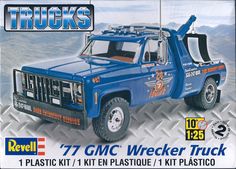 the truck is blue with orange lettering on it's front and back sides, as well as an additional tool box