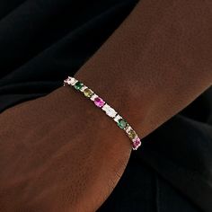 Elevate your everyday look with our Multicolor Mixed Oval Cut Tennis Bracelet in 5mm. This 14k White Gold piece features a mix of colorful hand-set stones arranged in an oval cut pattern, making a statement wherever you go. Pair it with the Multicolor Oval Cut Tennis Chain for a bold set. This product is guaranteed for life – GLD will repair or replace the item should you experience any defects in craftsmanship or breakage. Specifications - Width: 5mm - Length: 7", 8", & 9" - Weight: (Weight can Expensive Jewelry Luxury, Tennis Chain, Expensive Jewelry, Gold Piece, Vermeil Jewelry, Custom Earrings, Gold Plated Bracelets, Pendant Bracelet, Tennis Bracelet