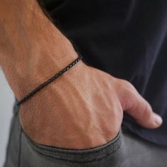 "Looking for a gift for your man? You've found the perfect item for this!  Introducing our versatile and stylish dainty stainless steel bracelet, designed exclusively for men who appreciate a touch of elegance in their accessories. Crafted with meticulous attention to detail, this bracelet is available in three timeless colors: gold, silver, and black. Made from high-quality stainless steel, it boasts exceptional durability, ensuring it will withstand the test of time. The sleek and minimalistic design adds a modern touch to any outfit, making it perfect for everyday wear or special occasions. Whether you're looking to make a fashion statement or gift someone a sophisticated accessory, this dainty stainless steel bracelet is a must-have addition to any gentleman's jewelry collection. Brace Minimalist Jubilee Bracelet For Father's Day, Minimalist Stainless Steel Chain Bracelet For Friendship, Adjustable Chain Bracelet As Gift, Adjustable Durable Chain Bracelet As Gift, Durable Adjustable Chain Bracelet As A Gift, Durable Adjustable Chain Bracelet For Gift, Minimalist Stainless Steel Friendship Bracelet, Durable Braided Bracelet For Gift, Durable Braided Bracelet For Gifts