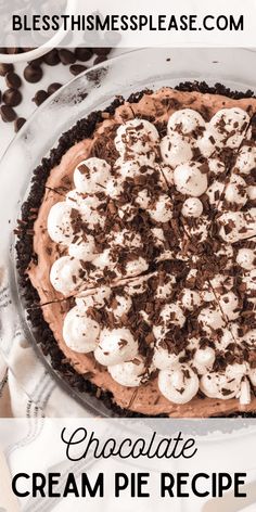 a chocolate cream pie with marshmallows on top and text overlay that reads, chocolate cream pie