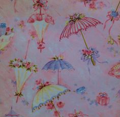 a pink background with umbrellas and flowers on it