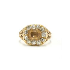 A foil-backed cushion citrine is set in a surround of old mine diamonds totaling approximately 1.10 carats in a 15 karat yellow gold mounting with closed back settings and decoratively engraved shank. Circa 1800. 3 Square Diamond Engagement Rings, Chunky Engagement Rings, Georgian Engagement Ring, Signet Engagement Rings, Square Diamond Engagement Ring, Georgian Ring, Vintage Gold Engagement Rings, Victorian Engagement Rings, Edwardian Ring