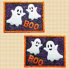 two halloween patch designs with boo and ghost faces on them, one is purple and the other is orange