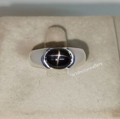 Black Star Diopside Men Ring, Star Gemstone, Black Gemstone Mens Ring, Black Star Ring, 925 Sterling Silver, Fathers Day Gifts *Material - 925 Sterling Silver *gemstone - 100% natural black star diopside *Stone shape-  oval cut cabochon *gemstone Color -  Black *Gemstone Size - 8×10 mm  *stone weight - 4.85 carat *Band Color - 925 sterling silver/ u can customized on the band color *Ring For Boys & Men *astrological engagement ring *Please feel free to contact me, I'm very happy to solve your qu Ring Boy, Star Sapphire Ring, Star Sapphire, Star Ring, Black Star, Color Ring, Gemstone Colors, Rings Statement, Sapphire Ring