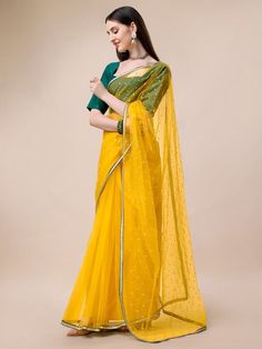 Mustard-colored & Gold-colored sareeDesign DetailsMustard & gold-toned sareeEmbroidered saree with embroidered borderHas zari detailThe saree comes with an unstitched blouse pieceThe blouse worn by the model might be for modelling purpose only. Check the image of the blouse piece to understand how the actual blouse piece looks like. Yellow Saree Blouse Combination, Saree Blouse Combination, Yellow Saree Blouse, Net Sarees, Western Kurtis, Saree Sale, Yellow Saree, Bandhani Saree, Net Saree