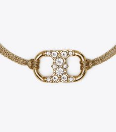 Embrace Ambition Pavé Bracelet: Women's Designer Bracelets | Tory Burch Tory Burch Bracelet, Pave Bracelet, Designer Bracelets, Tory Burch Jewelry, Jewelry Accessories Ideas, Dope Jewelry, The Embrace, Va Va Voom, Hinged Bracelet