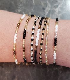 This listing is a collection of 7 dainty New Year's Eve/day bracelets! minimalistic and perfect for everyday wear. Perfect gift for someone or yourself! Each bracelet is sold separately and numbered on the last picture so you can make sure you're getting the right bracelet. Comes in many sizes, and let me know if you don't see yours! All of our jewelry comes gift-wrapped in a little bag. Spice up your jewelry collection and celebrate the new year with these beaded bracelets. If you have any questions or anything else feel free to contact me! Beaded bracelets All hand-made by simplyradiantjewelry waiting for YOU to order ~ Simplyradiantjewelry. Handmade Simple Adjustable Beaded Bracelets, Handmade Minimalist Beaded Bracelets For Everyday, Handmade Minimalist Beaded Bracelets, Handmade Minimalist Everyday Beaded Bracelets, Minimalist Handmade Everyday Beaded Bracelets, Simple Adjustable Beaded Bracelet With Tiny Beads, Dainty Friendship Bracelets With Spacer Beads As Gift, Dainty Hand Wrapped Beaded Bracelets For Everyday, Simple Handmade Everyday Bracelets