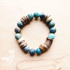 Frosted African Turquoise and Wood Stretch Bracelet Adjustable Turquoise Beaded Bracelets With Wooden Beads, Hippie Turquoise Hand-strung Bracelets, Earthy Turquoise Bracelets For Festival, Spiritual Turquoise Beaded Bracelets With Wooden Beads, Spiritual Turquoise Beaded Bracelet With Wooden Beads, Turquoise Beaded Bracelets With Wooden Beads For Healing, Brown Beaded Bracelets With Natural Stones For Beach, Brown Natural Stone Beaded Bracelets For Beach, Brown Natural Stones Beaded Bracelets For Beach