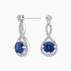 Sapphire and Diamond Twist Earrings | Annalise | Brilliant Earth Formal Bridal Earrings With Diamond Accents, Blue Diamond Earrings For Formal Occasions, Elegant Blue Diamond Earrings With Pave Setting, Timeless Diamond Cut Bridal Earrings For Formal Occasion, Timeless Formal Bridal Earrings With Diamond Cut, Timeless Diamond Cut Earrings For Formal Occasions, White Gold Sapphire Earrings With Pave Setting, Sapphire Earrings With Pave Setting, Sapphire Earrings With Pave Setting In Fine Jewelry Style