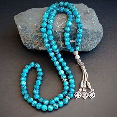 This handmade gemstone tasbih; It is also known by different names such as misbaha, prayer beads, rosary, chapelet, dhikr beads, misbah, sibha, stress beads. This islamic tasbeeh is a great idea on muslim gift. All beads are quartz gemstone. Tassel material is stainles. PRODUCT DETAILS Grain Shape: Round Grain Length: 8mm (0.31") Grain Width: 8mm (0.31") Total Length: 50cm (19.7") All our products are handcrafted and carefully manufactured. The main principle of our store is to deliver quality p Adjustable Bohemian Rosary With Gemstone Beads, Bohemian Beaded Rosary As Gift, Spiritual Faceted Bead Bracelet, Spiritual Rosary Bracelet With Polished Beads, Bohemian Rosary Bracelet With Faceted Beads, Bohemian Rosary Bracelet With Faceted Beads As Gift, Spiritual Rosary Bracelet With Faceted Round Beads, Handmade Rosary Bracelet For Meditation, Faceted Spiritual Beads For Gifts