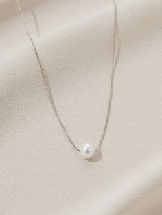 Olive & Piper Drew Freshwater Pearl Pendant Classic White Necklace With Delicate Chain, White Classic Necklace With Delicate Chain, Everyday White Gold Pearl Necklace, Simple Silver Jewelry With Pearl Charm, Simple Silver Jewelry With Pearl Chain, Simple Silver Pearl Drop Jewelry, White Pearl Necklace With Delicate Round Pendant, White Pearl Necklace With Delicate Chain And Round Pendant, Everyday White Gold Pearl Drop Necklaces