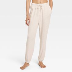 Stay comfy in classic style as you hang with friends or lounge around the house wearing these Cozy Ribbed Wide-Leg Pants from Auden™. Made from lightweight, super-cozy soft-brushed rib fabric with spandex, these jogger pants feature a full elastic waistband with a drawstring to help you find a snug, stay-put fit. Cut to an ankle length, they're designed with tapered legs and also feature side pockets for easy stashing of small items. Auden™: Comfort true to every shape & hue. Cute Lounge, Hanging With Friends, Garment Details, Rib Fabric, Oatmeal Color, Fleece Joggers, Womens Fleece, Bottom Clothes, Pull On Pants