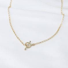 "14K Gold Toggle and Rolo chain necklace *The chain, toggle clasp and all components are 14K yellow gold (If you order a 16\" necklace, it will be a toggle clasp plus chain will be 16\".) The toggle clasp is about 12mm. 2.3mm Rolo chain Please read our policies before you place your order. https://www.etsy.com/shop/SashJewelry/policy?ref=shopinfo_policies_leftnav To see other Mother daughter necklace set click here: https://www.etsy.com/shop/SashJewelry?section_id=12441134&ref=shopsection_le Classic Chain Link Necklace With Toggle Clasp, Gold Minimalist Chain Link Toggle Necklace, Gold Minimalist Toggle Chain Link Necklace, Dainty Gold Toggle Necklace With Lobster Clasp, Minimalist Gold Chain Link Toggle Necklace, Gold Chain Link Toggle Necklace In Minimalist Style, Minimalist Gold Toggle Chain Link Necklace, Classic Toggle Necklace With Oval Link Cable Chain, Gold-tone Link Toggle Necklace