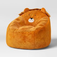 a stuffed animal chair with a teddy bear on it