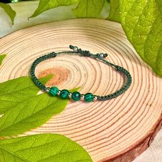 Elevate your boho-chic style with this stunning Malachite Bead Thread Macrame Bracelet. Handcrafted with 4 green malachite beads and woven with durable polyester waxed thread, this adjustable bracelet is the perfect accessory for the modern free-spirit. The intricate macrame design not only adds a touch of earthy elegance but also allows for a comfortable, customized fit. Whether you're dressing up or down, this versatile green bracelet will seamlessly complement your look. Embrace the beauty of Thread Macrame, Intricate Macrame, Beads Macrame, Earthy Elegance, Green Bracelet, Green Malachite, Boho Macrame, Simple Bracelets, Macrame Bracelet