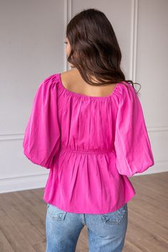 The Bold Blossom Pink Peasant Blouse is a charming and versatile off-the-shoulder top that brings a touch of bohemian flair to your wardrobe. With its relaxed and flowy silhouette, this blouse offers a casual yet stylish look. Fit: Relaxed Material: 100%PolyesterOur model is wearing: Size Small Spring Flowy Blouse With Smocked Back, Spring Off-shoulder Top With Blouson Sleeves, Fall Vacation Blouse With Smocked Back, Flowy Blouse With Smocked Back For Day Out, Bohemian Pink Top With Smocked Back, Spring Long Sleeve Off-shoulder Top With Smocked Bodice, Flowy Puff Sleeve Blouse With Smocked Back, Chic Spring Off-shoulder Top With Blouson Sleeves, Fall Off-shoulder Blouse With Blouson Sleeves