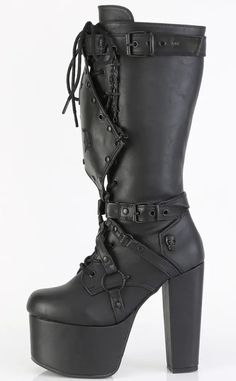 Tall, sleek and badass! The TORMENT-218 boots are knee-high marvels, featuring luxe faux leather and barbed wire chains. The ultimate platform heels, the Torment series is sure to *torment* your enemies with their height and beauty. Vegan Black PU leather 5 1/2" Inch (140mm) Heel 3" Inch (76mm) Platform Lace-Up Front Featuring Harness Strapped Front Shield w/ Clip-On Hanging Barbed Wire Chain & Round & Skull Studded details Inner Side Zip Closure U.S women's sizing-refer to size chart for more info Edgy Knee-high Heeled Boots For Streetwear, Leather Gothic Knee-high Combat Boots, Edgy Knee-high Boots For Streetwear, Punk Leather Knee-high Boots For Streetwear, Knee-high Faux Leather Punk Platform Boots, Gothic Leather Knee-high Boots, Gothic Leather Knee-high Boots For Alternative Fashion, Edgy Faux Leather Heeled Boots For Streetwear, Punk Knee-high Combat Boots For Alternative Fashion