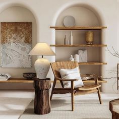 a living room filled with lots of furniture and decor on top of a wooden table