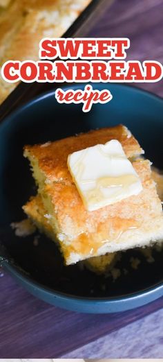 a close up of a plate of food on a table with bread and butter in the background