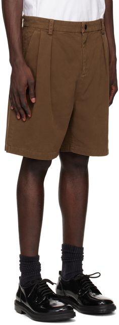 Wide-leg cotton twill shorts. · Belt loops · Three-pocket styling · Zip-fly · Pleats at front · Darts at back Supplier color: Brown Brown Relaxed Fit Cotton Shorts, Brown Cotton Bermuda Bottoms, Brown Cotton Bermuda Shorts, Cotton Bermuda Shorts With Belt Loops, Brown Bottoms With Patch Pockets For Summer, Brown Knee-length Shorts With Pockets, Brown Cotton Knee-length Shorts, Brown Shorts With Side Pockets, Brown Cotton Cargo Shorts With Side Pockets