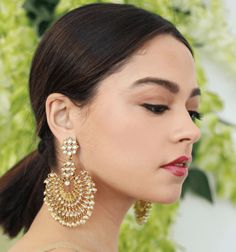 Designed in the USA, handcrafted with love by our artisans in India these beautiful Blossom Box Earrings come in a gold plated finish with stunning stones to make these exquisite earrings really special - this pair are light in weight & can be paired with almost any outfit. Perfect accessory for every jewelry box! Handcrafted Metal: Metal Alloy, Gold Plated Stone: Faux mini pearls Size: Length: 3" Width: 2.5" Festive Gold Bridal Earrings For Pierced Ears, Gold Earrings For Diwali Gifts, Chandbali Temple Jewelry Earrings With Elegant Design, Yellow Gold Chandbali Earrings, Elegant Chandbali Temple Jewelry Earrings, Traditional Gold Plated Bridal Earrings, Gold Earrings For Diwali Celebration, Gold Earrings With Elegant Design For Diwali, Intricate Design Dangle Earrings For Reception