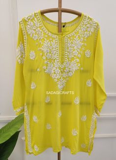 DESCRIPTION Kurti Fabric : Modal  Sleeves : 3/4 Sleeves Style : Short Top Length : 28-30 Inches Occasions : Casual Wear, Office Wear, Festive Wear Garment Care : Hand Wash Only Price Includes : 1x Kurti Yellow Traditional Wear With Cutdana And Long Sleeves, Long Sleeve Yellow Kurta With Cutdana, Yellow Long Sleeve Kurta With Cutdana, Traditional Yellow Tunic For Festive Occasions, Traditional Yellow Kaftan With Resham Embroidery, Summer Traditional Wear With Chikankari Embroidery And Long Sleeves, Semi-stitched Blouse With Chikankari Embroidery For Eid, Summer Chikankari Embroidered Long Sleeve Traditional Wear, Summer Traditional Wear With Long Sleeve Chikankari Embroidery