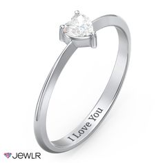 Create the perfect symbol of your commitment and make a romantic gesture she will never forget. This beautiful promise ring features a sparkling heart-shaped gemstone in a modern 3-prong setting on a tapered, knife-edge band. Personalize this ring with a birthstone or favorite gemstone, and add a meaningful engraving to make a one-of-a-kind gift. This ring will be handcrafted in your choice of sterling silver, white, yellow, or rose gold. Modern Heart-shaped Anniversary Rings, Modern Heart Shaped Anniversary Rings, Single Diamond Promise Ring For Valentine's Day, Minimalist Solitaire Heart Ring For Anniversary, Modern White Gold Heart Promise Ring, Valentine's Day Single Diamond Promise Ring, Minimalist Heart Cut Diamond Ring For Anniversary, Valentine's Day Promise Jewelry With Single Diamond, Anniversary Rings With Single Diamond For Valentine's Day