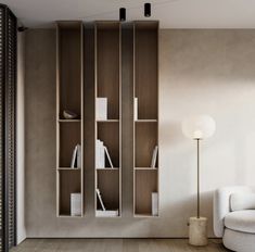 a living room filled with furniture and bookshelves next to a wall mounted book shelf