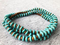 Long Turquoise Beaded Necklace Turquoise and Wood Beads Long - Etsy Turquoise Gemstone Beads Bracelet For Beach, Turquoise Gemstone Beaded Bracelets For Beach, Turquoise Necklace With Spacer Beads For Beach, Turquoise Round Beads Necklace For Beach, Turquoise Beach Necklace With Round Spacer Beads, Turquoise Necklace With Round Beads For Beach, Festival Wooden Beads In Turquoise, Turquoise Spiritual Beaded Bracelets For Beach, Spiritual Turquoise Beaded Bracelets For Beach