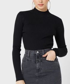 Classic black knit top. Imported AC2766B Winter Black Ribbed Top, Black Fine Knit Turtleneck Sweater, Black Stretch Knit Top For Winter, Stretch Black Knit Top For Winter, Black Long Sleeve Fine Knit Top, Black Fine Knit Long Sleeve Tops, Trendy Black Stretch Sweater, Casual Black Ribbed Sweater, Black Ribbed Fitted Tops