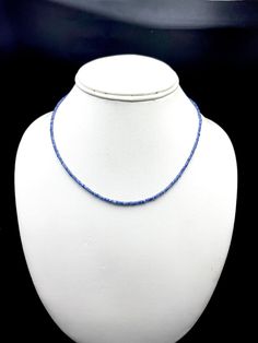 100% Natural Blue Sapphire Faceted rondelle shape beaded necklace with 925 Sterling Silver lobster clasp in metal wire. Details : - Gemstone: Blue Sapphire Calibration of beads: 2.50 millimeters Length: 16.00 inches Gross Weight: 28.05 carats Net Weight: 24.05 carats SKU: SINGLESTR004 100 % NATURAL BLUE SAPPHIRE BEADS FACETED RONDELLE SHAPE BEADS PERFECT CALIBRATED 2.50MM BEADS NECKLACE IN METAL WIRE 925 STERLING SILVER LOBSTER CLASP TOP QUALITY NATURAL BLUE SAPPHIRE RAW MATERIAL USED GENUINE PR Blue Oval Faceted Bead Jewelry, Adjustable Single Strand Sapphire Necklace, Sapphire Rondelle Gemstone Beads Jewelry, Blue Faceted Round Bead Necklaces, Blue Single Strand Necklace With Oval Beads, Blue Faceted Oval Beads Jewelry, Sapphire Rondelle Necklace As A Gift, Sapphire Single Strand Necklace With Round Beads, Sapphire Rondelle Necklace For Gift