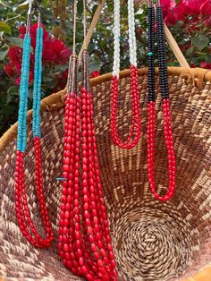 Introducing our exclusive Native American Coral and Pearl heishi necklace, a radiant embodiment of tradition and craftsmanship. This captivating piece features a seamless blend of warm coral stones with the timeless elegance of pearls, meticulously handcrafted by a skilled Native American female artisan from the Santo Domingo Pueblo. The necklace's design symbolizes the fusion of cultural richness with contemporary elegance. Each stone is meticulously chosen and arranged, showcasing the artistry Traditional Coral Beaded Necklaces With Polished Beads, Traditional Coral Necklace With Polished Beads, Artisan Red Coral Beaded Necklace With Polished Beads, Traditional Handmade Red Coral Beads, Handmade Red Beaded Necklaces For Traditional Ceremonies, Handmade Red Necklace For Traditional Ceremonies, Traditional Coral Beaded Necklaces, Bohemian Red Coral Beaded Necklace With Polished Beads, Handmade Oval Beads Red Coral Jewelry