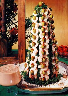 a christmas tree made out of food on a plate