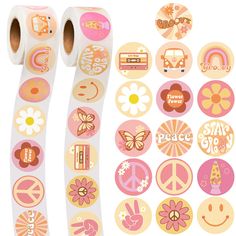 two rolls of pink and yellow stickers next to each other with different designs on them