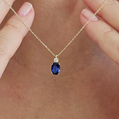 This 14K Gold Oval Cut Sapphire Necklace is designed carefully to brighten your neck. It is suitable for everyday use as well as for your special days. Can be a perfect gift with its stylish and ambitious look. Sapphires have been valued for centuries and have often been associated with qualities such as wisdom, loyalty, nobility, and sincerity. They have a rich history in various cultures and are often linked with royalty and spirituality. Not only on a bracelet or necklace but also in all jewe Sapphire Necklace Simple Zales, Blue Sapphire Necklace Simple, Gold And Sapphire Necklace, Dainty Oval Sapphire Jewelry, Blue Oval Pendant Necklace For Anniversary, Blue Oval Pendant Necklace In Dainty Style, Dainty Blue Oval Pendant Necklace, Blue Dainty Oval Pendant Necklace, Elegant Blue Oval Cabochon Necklace