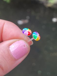 Non-Metal Earrings, Beach Balls, Plastic Post Studs For Sensitive Ears, Nickel Free Hypoallergenic Stud Earrings, Great for kids or women These earrings are handmade on a plastic post for your sensitive ears. They are very lightweight and comfortable to wear. These beautiful colorful beach ball stud earrings are made of resin. They have a flat back and they measure 5mm round. They look great on kids and adults. Best of all you don't have to worry about metal allergies because they do not contain Fun Rainbow Hypoallergenic Jewelry, Rainbow Hypoallergenic Earrings As Gift, Adjustable Rainbow Earrings As Gift, Novelty Multicolor Earrings With Ear Wire, Adjustable Whimsical Earrings For Summer, Summer Hypoallergenic Multicolor Jewelry, Fun Plastic Earrings For Gifts, Fun Rainbow Colored Earrings As Gift, Cute Adjustable Earrings For Beach