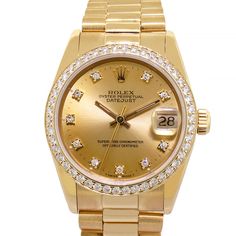 Description Guaranteed Authentic Rolex Lady-Datejust with a 31mm 18K yellow gold case and a champagne diamond dial. This fine timepiece features a custom G/VS2 quality brilliant cut diamond bezel and an 18K yellow gold President bracelet. This watch is in excellent condition. It comes with a One Year Warranty from Da Vinci Fine Jewelry, Inc., a gift box, instructions, and certified retail appraisal from Da Vinci Fine Jewelry. Details BRAND Rolex COLLECTIONS Datejust Model 68278 MOVEMENT Automati Classic Gold Diamond Watch With Brilliant Cut, Yellow Gold Diamond Watch For Anniversary, Luxury Gold Diamond Watch With Brilliant Cut, Elegant Yellow Gold Watch With Date Display, Classic Gold Diamond Watch, Yellow Gold Diamond Watch With Round Dial For Anniversary, Gold Diamond Watch With Vvs Clarity For Anniversary, Formal Yellow Gold Diamond Watch With Date Display, Formal Gold Diamond Watch With Brilliant Cut