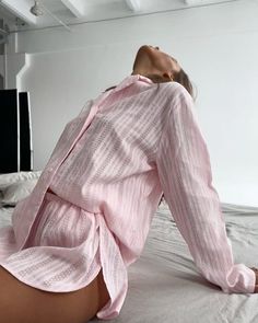 Experience ultimate comfort and style with our Luxurious Cotton Floral Embroidered Pajama Set. Crafted from pure cotton, this exquisite set features delicate floral embroidery in a charming pink hue. The set includes a long-sleeved open-front cardigan with a classic collar and matching short pants, making it perfect for lounging in style during the cooler autumn evenings. Elevate your sleepwear collection with this luxurious ensemble.Key Features:Premium Cotton Fabric: Made from high-quality cotton, this pajama set offers exceptional softness, breathability, and durability for a comfortable night's sleep.Elegant Floral Embroidery: Delicate floral embroidery adds a touch of sophistication and femininity to the ensemble, making it a stylish choice for bedtime or relaxation.Versatile Design: Pink Cotton Loungewear Sets, Feminine Cotton Sleepwear Set, Pink Cotton Sleepwear For Spring, Feminine Cotton Sleepover Sets, Pink Long Sleeve Matching Set Sleepwear, Pink Relaxed Fit Cotton Set, Pink Cotton Relaxed Fit Sets, Pink Relaxed Fit Long Sleeve Set, Pink Cotton Sets With Relaxed Fit