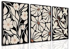 three black and white paintings with flowers on them