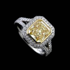 Elegant Yellow Emerald Cut Diamond Ring, Elegant Yellow Emerald-cut Diamond Ring, Yellow Diamond Ring For Anniversary, Yellow Platinum Diamond Wedding Ring, Dazzling Yellow Brilliant Cut Diamond Ring, Dazzling Yellow Diamond Ring With Accents, Dazzling Brilliant Cut Yellow Diamond Ring, Elegant Yellow Ring With Center Stone, Elegant Yellow Rings With Diamond Accents