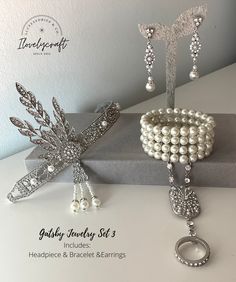 "Great Gatsby jewelry and 1920s jewelry (inspired on Daisy Buchanan's): 1920s headpiece, Gatsby pearl bracelet, Gatsby headpiece, feather headband, art deco earrings, pearl necklaces, Great Gatsby necklace, broochs, sequined shawl ... All Gatsby accessories to complete your Roaring 20s outfit or your flapper dress. Perfect for a 1920's party, vintage weddings, a vintage inspired bride (Art deco) or even Downton Abbey themed party. BRACELET: It is decorated with lots of sparkling rhinestones and Flapper Jewelry 1920s, 1920s Accessories Aesthetic, 20s Accessories Jewelry, 20s Jewelry Accessories, 1920 Jewelry Gatsby, The Great Gatsby Jewelry, Great Gatsby Earrings, 1920s Gift Ideas, Silver Gatsby Jewelry For Vintage Events