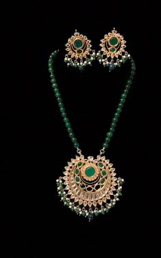 Semi Precious Emerald Kundan Long Necklace Set, Green Beads Necklace Set, Designer Indian Bridal Jewelry Set, Indian Emerald Jewelry Set, ITEM DESCRIPTION Metal        = Mixed Alloy Occasion  = Wedding, Party Wear, Bridal Color        = Green and Clear Free Shipping 100% Satisfaction Guarantee: 1 Year Warranty, Long Lasting Plating, High-Quality Stones Occasion: Perfect choice for any Indian occasion.  Care: It is advisable that you keep products away from direct heat, humidity, and moisture. It is best to preserve your jewelry in the box. Keep Away From Water, Spray And Perfumes For Better Look. Happy Buying :) Emerald Beads Jewelry Indian Pendant, Luxury Emerald Chandbali Necklace With 17 Jewels, Luxury Zari Work Necklace For Festive Season, Luxury Emerald Meenakari Necklace For Festivals, Luxury Traditional Emerald Necklace For Diwali, Luxury Green Temple Necklace With Meenakari, Luxury Green Temple Necklace For Formal Occasions, Luxury Emerald Temple Necklace For Receptions, Luxury Meenakari Emerald Necklace For Festivals