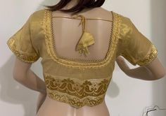 Item code-52 Golden color silk blouse with golden pearl work short sleeves golden thread emb at sleeves , waist and back, front kaj buttons backside Dori 38"40 chest size 40" Length 15" Waist-36" Pearl Work, Golden Pearl, Golden Thread, Work Shorts, Back Neck, Golden Color, Embroidered Lace, Chest Size, Saree Blouse